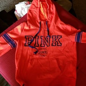 Victoria secrets bright orange hoodie.